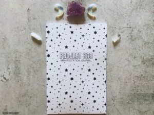 Project 369 Manifestation Journal with black stars on the cover